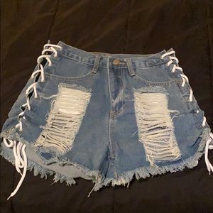 High rise distressed demin shorts! NEVER WORN!